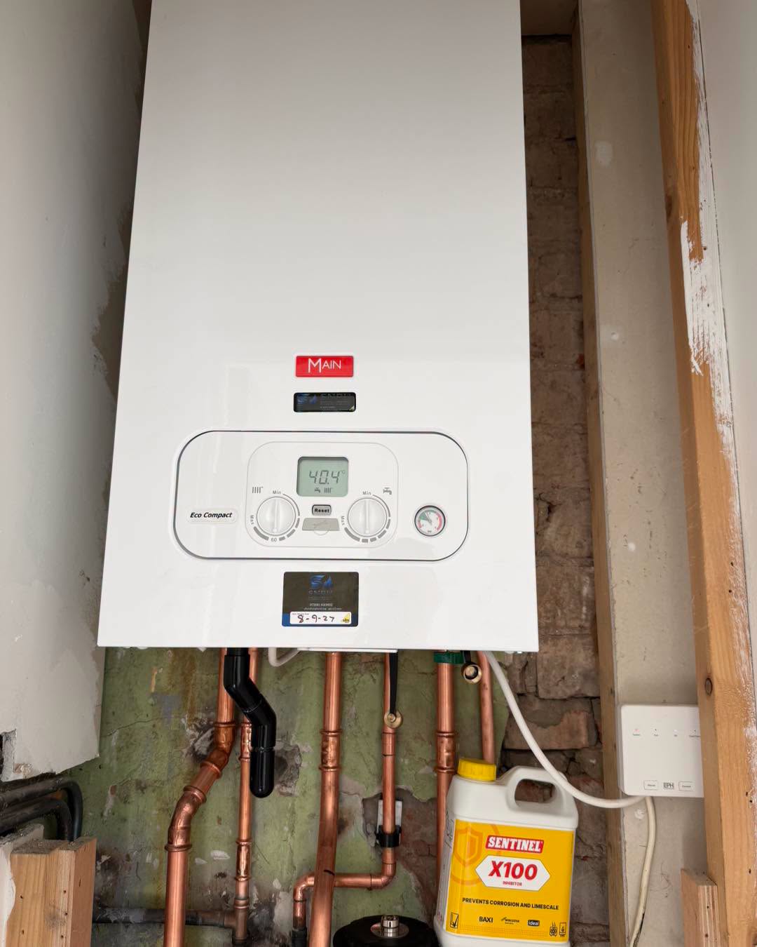 Main Eco Compact boiler with copper tails during installation